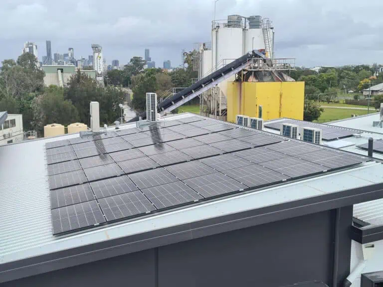 Commercial building with multiple solar panels on the roof