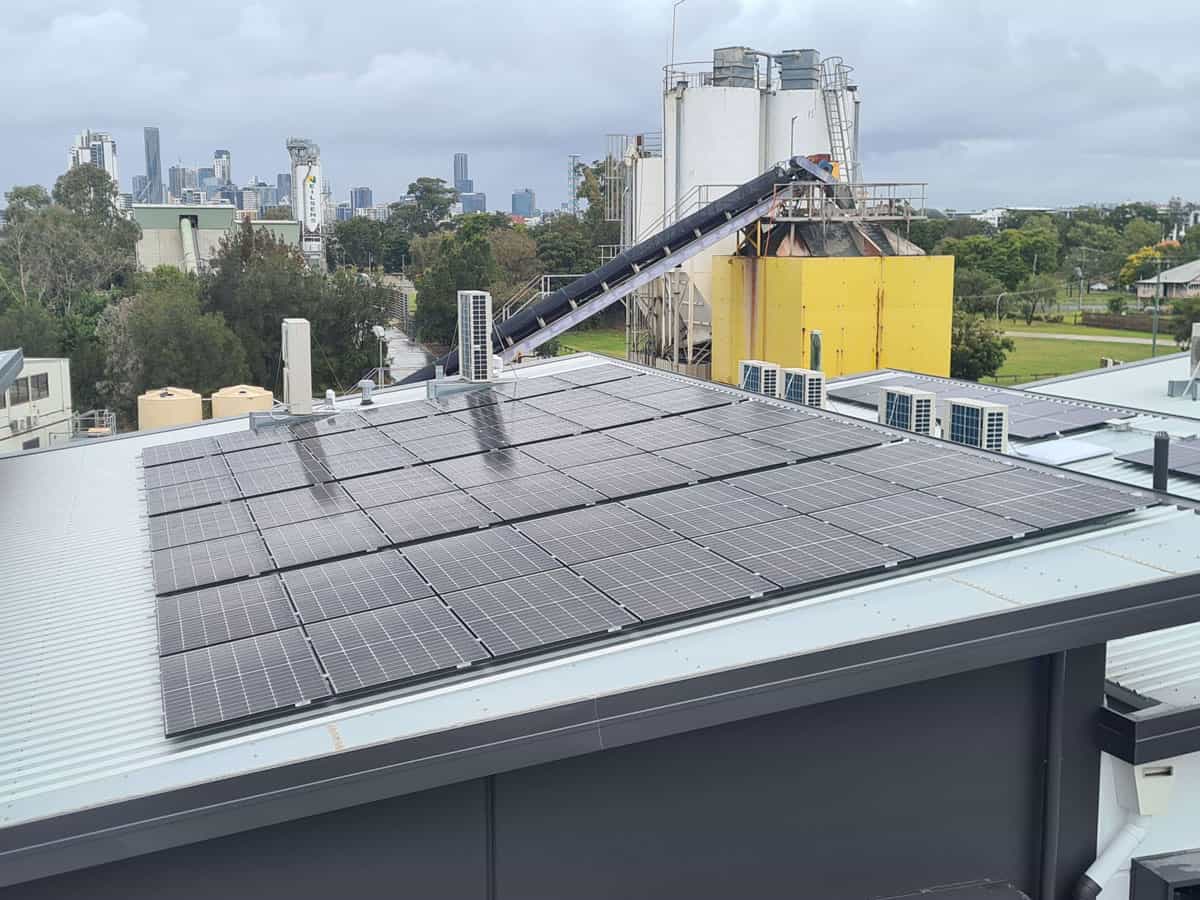 Commercial building with multiple solar panels on the roof